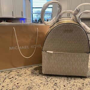 Michael Kors Sheila Backpack in Beige/Cream with Gold Hardware
